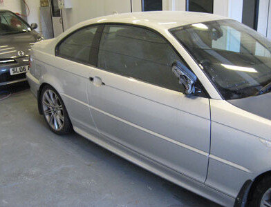 A silver BMW coupe after a respray